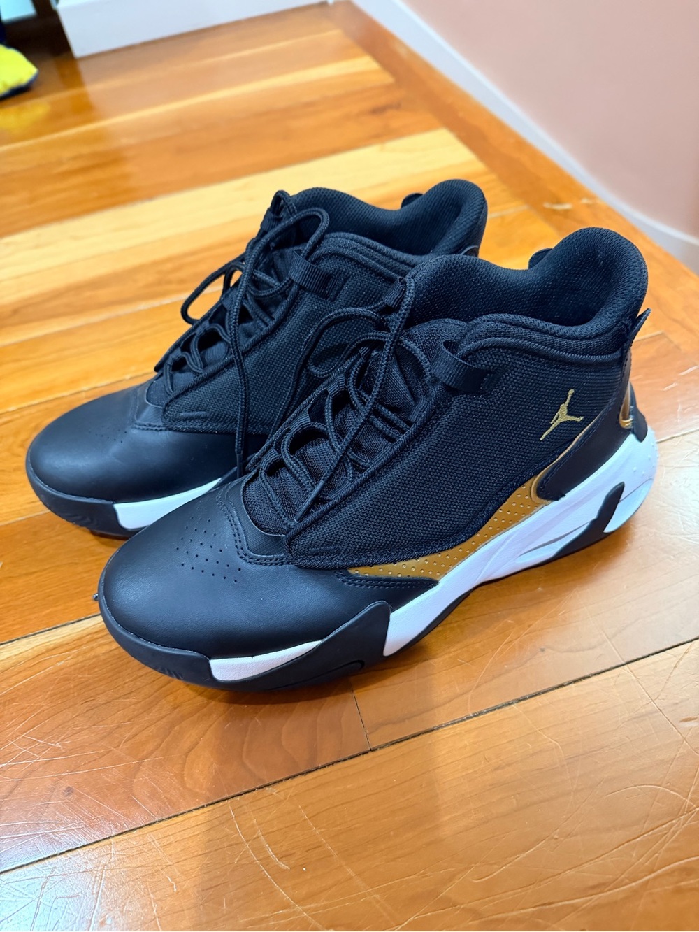 Jordan Black and Gold Low-Top Basketball Sneakers